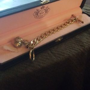 Juicy Couture heart charm bracelet.